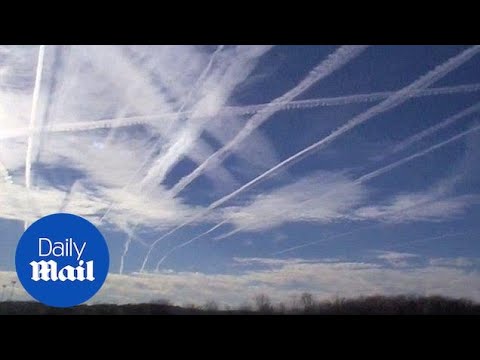 NASA explain what contrails are and their atmospheric effect - Daily Mail